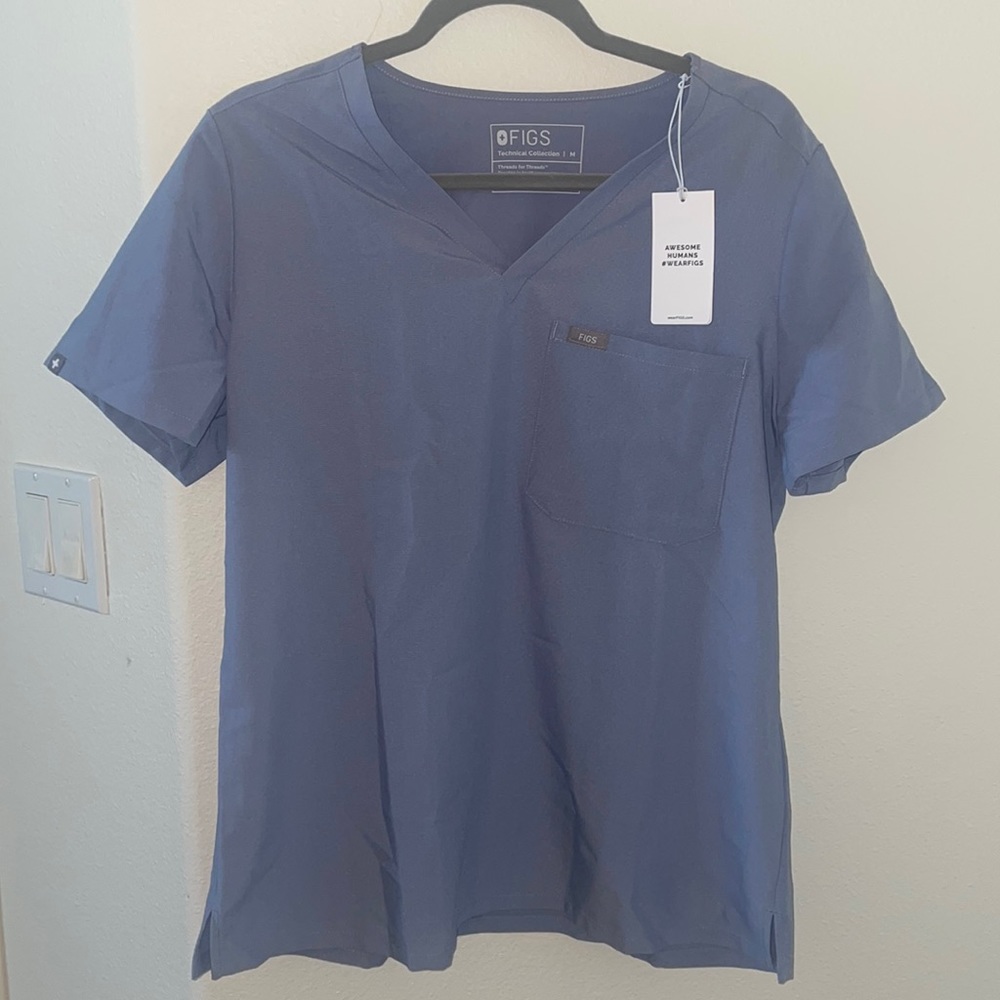 Limited Edition Figs Scrub Top . Catarina one pocket , color is vapor blue